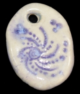 Handmade ceramic bear-track bead